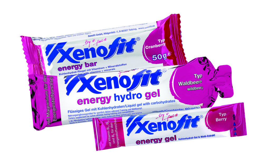 Packungen von Xenofit Energie-Riegel und Gels
